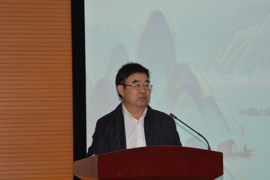 说明: 武友德发言(近景)